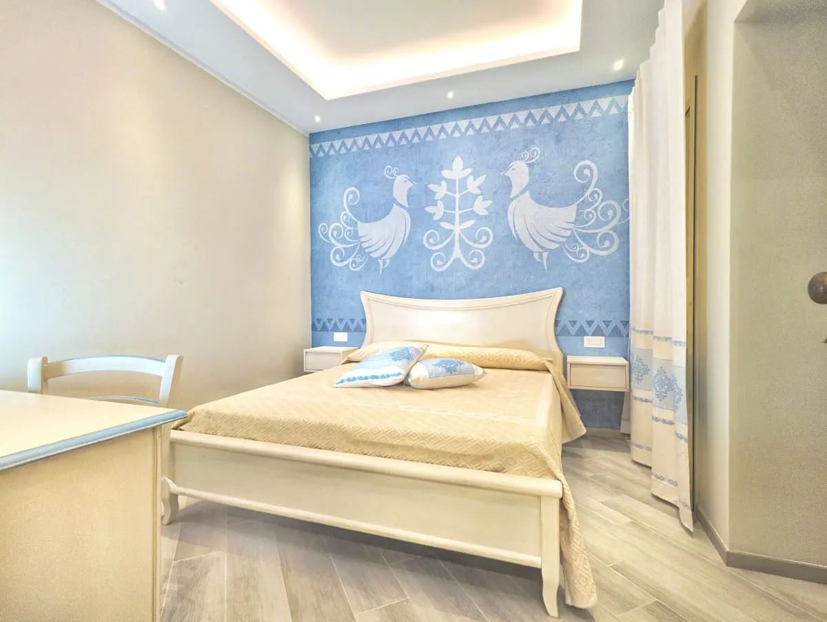 camera-pavoncelle-blu-05-sa-pintadera-guest-house